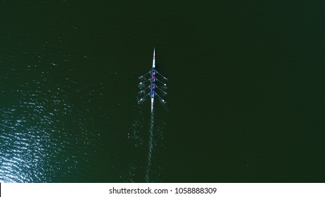 Aerial Shot Rowing Team On  Water, Top View