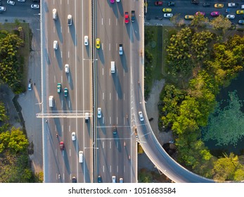 Aerial Shot Of Super Highway Traffic With Cars And Busy Roads In Day Time