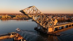 An Aerial Shot Of The Train Drawbridge On Wreck Lead Channel In Island Park, NY At Sunset