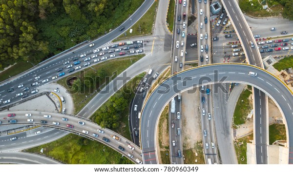 Aerial  shot,view from the drone on\
the road junction of\
Kuala-Lumpur,Malaysia