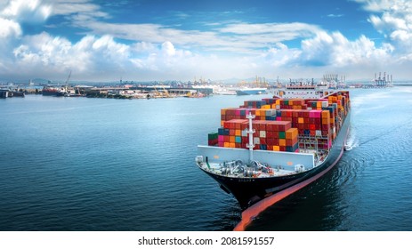 Aerial side view of cargo ship carrying container and running for export  goods  from  cargo yard port to custom ocean concept technology transportation , customs clearance. Freight Forwarding Service
