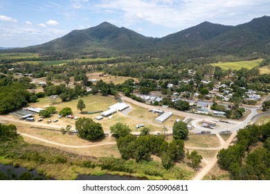 Aerial Of Small Country Town In A Valley, Showing Semi Trailers, Showgrounds, Cattle Yards, Homes, Roads And Lifestyle. Finch Hatton, Queensland, Australia