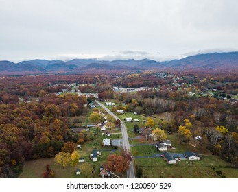 Aerial Of The Small Town Of Elkton, Virginia In The Shenandoah Valley With Mountains In The Far Distance