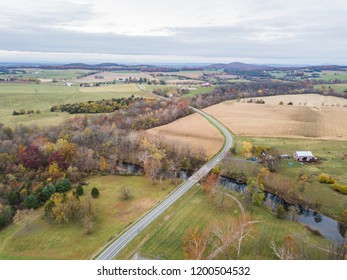 Aerial Of The Small Town Of Elkton, Virginia In The Shenandoah Valley With Mountains In The Far Distance