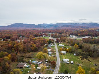 Aerial Of The Small Town Of Elkton, Virginia In The Shenandoah Valley With Mountains In The Far Distance