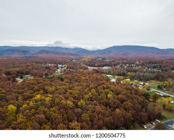 Aerial Of The Small Town Of Elkton, Virginia In The Shenandoah Valley With Mountains In The Far Distance