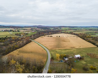 Aerial Of The Small Town Of Elkton, Virginia In The Shenandoah Valley With Mountains In The Far Distance