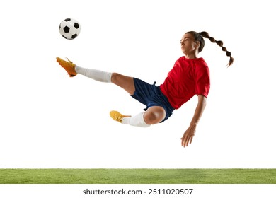 Aerial soccer stunt. Female player delivers impressive bicycle kick, aiming to opponents gates, showing energy of game. Concept of women and sport, team games, movement, victory, action. Ad - Powered by Shutterstock