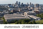 Aerial still image of Kansas City IRS Campus with downtown skyline on a sunny summer day