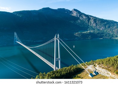 Aerial Summer Midday View Of Hardanger Suspension Bridge In Hardanger Fjord Connecting Oslo And Bergen , Norway