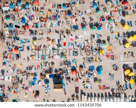 Aerial Summer View Of Crowded Beach Full Of People