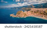 Aerial summer view from flying drone of Reggio Calabria, Italy, Europe. Astonishing morning cityscape of Scilla port. Spectacular seascape of Mediterranean sea. Traveling concept background.