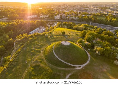 Aerial summer view of the Krakus Mound with amazing sunset view of the historical part of Krakow old town, Poland. Popular place to watch sunset in Cracow.