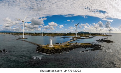 Aerial and summer view of lighthouse and seaside rocks with wind generators at Sinchang Windmill Coast of Hankyung near Jeju-si, Jeju-do, South Korea
 - Powered by Shutterstock