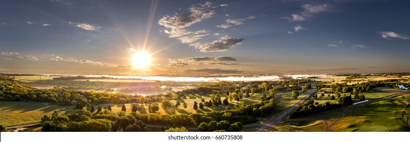 Aerial Sunrise Panoramic Cloudscape In The Midwest Town Of Mitchell, South Dakota.