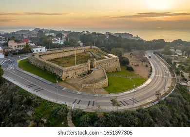 Aerial sunrise view of Forti de Sant Jordi, stone earthwork fortification protecting Tarragona from the North along the Mediterranean