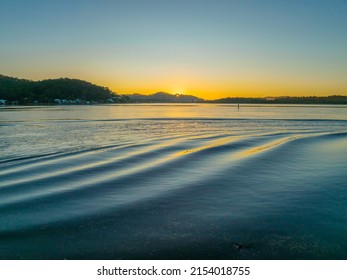 Aerial sunrise waterscape with a cloudless sky at Woy Woy on the Central Coast, NSW, Australia. - Shutterstock ID 2154018755