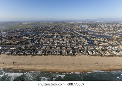 Aerial Of Sunset Beach Shoreline Homes In Orange County, California.  