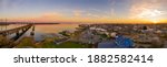 Aerial sunset panorama of Havre De Grace Harford County, Maryland, and the railroad bridge over the mouth of the Susquehanna River and the head of Chesapeake Bay one of the best American small towns