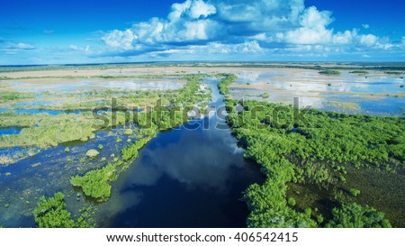 Aerial sunset view of Everglades swamp in Florida.