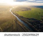 Aerial sunset view of Maritsa River passing near the city of Plovdiv, Bulgaria