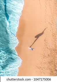 Aerial Of Surfer At Beach