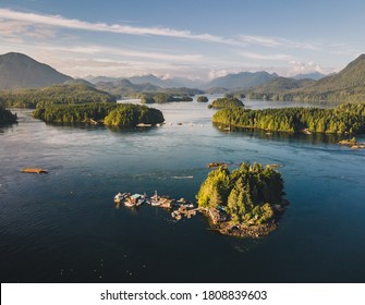 Aerial of Tofino inlet with islands and boats
