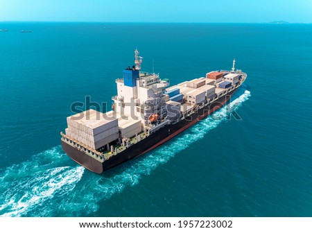 aerial top Cargo Ship for shipping by sea in dock.