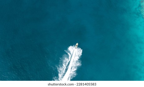 Aerial top down drone view of Jet Ski, Tropical Ocean Maldives island summer vacation - Powered by Shutterstock