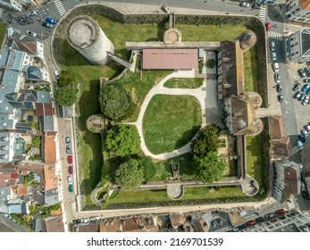 Aerial Top Down Ground Plan View Of Medieval Dourdan Castle, Square Shape With Eight Towers Including A Stand Alone Circular Donjon With Drawbridge Over The Moat In Essone Ile De France