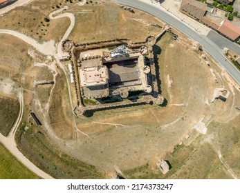 Aerial top down ground plan view of Turégano castle. Medieval feudal castle with donjon, circular towers integrating church of San Miguel