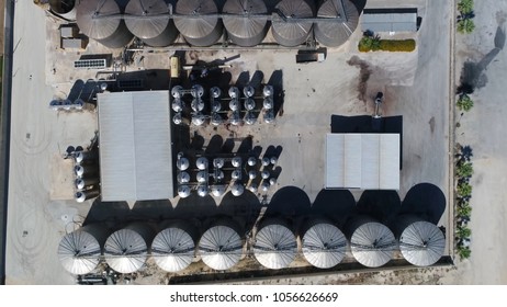 Aerial top down photo of wine producing factory and wine orchard winemaking is production of wine starting with selection of the fruit its fermentation into alcohol and bottling of finished liquid