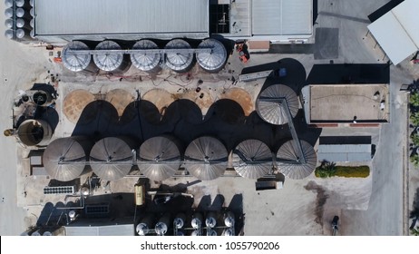 Aerial top down picture of wine producing plant and wine orchard winemaking is production of wine starting with selection of the fruit its fermentation into alcohol and bottling of finished liquid