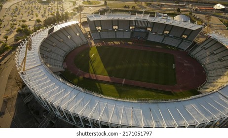 Aerial top down shot of empty Mario Alberto Kempes Football Stadium during sunset in Cordoba City,Argentina