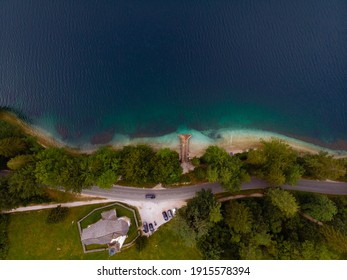 Aerial top down view of the Bohinj lake. Beautiful landscape ot the Triglav mountains, national park, summer forest and the church (Cerkev sv. Duha, Ribcev Laz), Slovenia, Europe - Shutterstock ID 1915578394