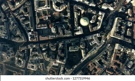 Aerial Top Down View Of The City Streets And Houses Pattern In The Centre Of Milan, Italy