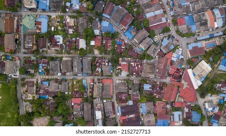 An aerial top down view of houses middle class income at Kampung Baru, Kuala Lumpur, Malaysia