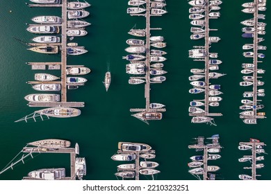 Aerial Top Down View Of Mamny Leisure Boats And Yachts Moored In Marina In Cascais, Portugal On The Portuguese Riviera