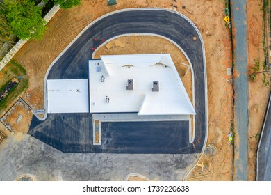 Aerial Top Down View Of Newly Built Credit Union Commercial Real Estate Bank Branch With Drive Through ATM 