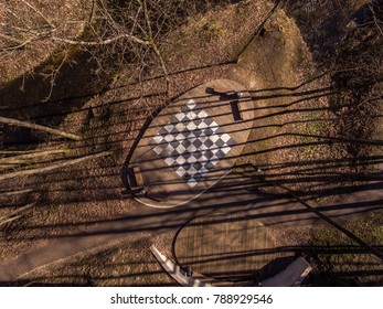 Aerial Top Down View Over Recreational Park During Early Spring, With A Chess Board Game Outdoors In Druskininkai, Lithuania.
