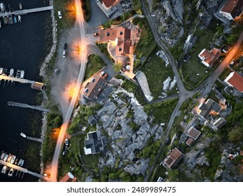 Aerial top down view of part of a coastal village in Sweden - Powered by Shutterstock