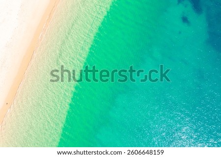 aerial top down view of pristine beach with turquoise water, overhead photography by drone