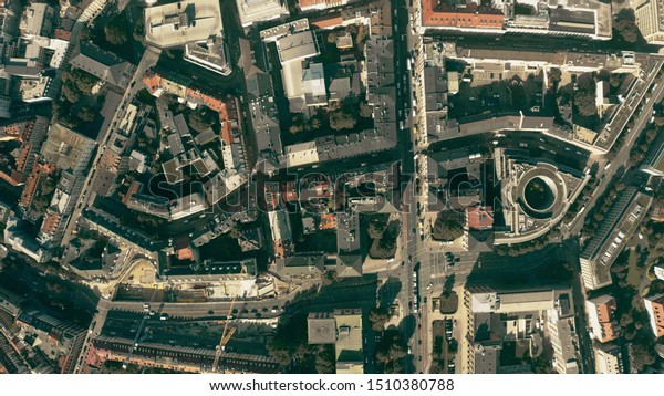 Aerial top down view of streets and buildings in\
Munich centre, Germany