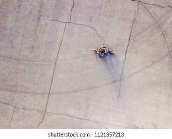 aerial top down view of young urban rider with bmx isolated copy space
