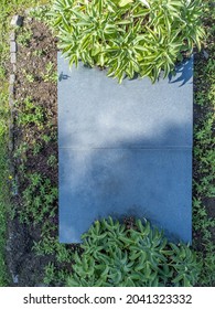 
Aerial Top Down-drone Photo Of Single Grave With No Writing On Tombstone