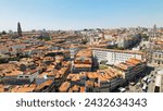 Aerial top panoramic view of Turin city historical centre, Royal Palace, Palazzo Carignano, San Lorenzo church, orange tiled roofs of buildings, sightseeings with Alps mountain range, Piedmont, Italy
