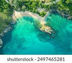 aerial top view above small island in front of Yanui beach in low tide. Sand dunes in the separate sea. Sandbars form in the Separated Sea when the water level goes down. green sea white sand beach
