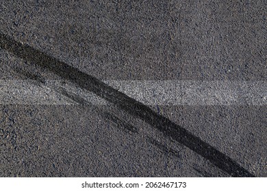 Aerial Top View Abstract Texture And Background Of Car Tire Drift Skid Mark On Road Race Track, Black Tire Mark On Street Race Track, Automobile And Automotive Concept.