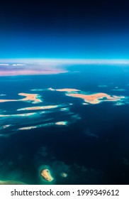 Aerial Top View From Airplane Coastline Egyptian Desert
Islands. Red Sea Sharm Al Sheikh Egypt. Amazing Shoot Bird Eye Plane Window Mountains. Travel Concept. Turbine Aircraft Engine Flying Over Ocean