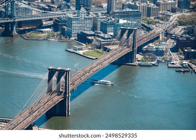 Aerial Top View of Brooklyn Bridge above the Hudson River - Powered by Shutterstock